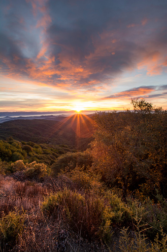 The sun rises over the Santa Cruz Mountains above San Jose