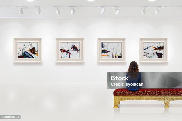 Young Woman Visits An Art Gallery Stock Photo - Download Image Now - Art Museum, Art, Painted Image