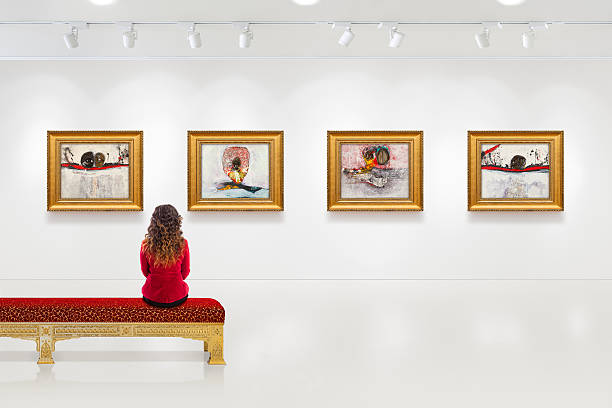 istock Young woman visits an art gallery 538040888