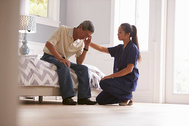 istock Nurse Making Home Visit To Depressed Senior Man 538043894