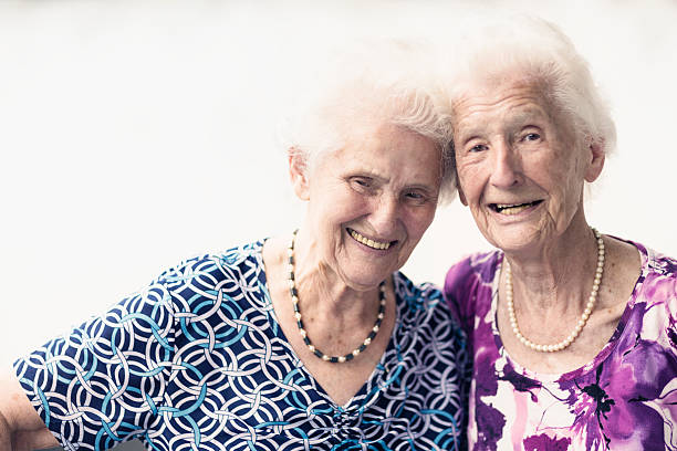istock senior women happy together 538044138