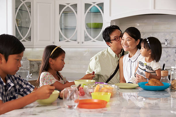 istock Father Leaving For Work After Family Breakfast In Kitchen 538044792
