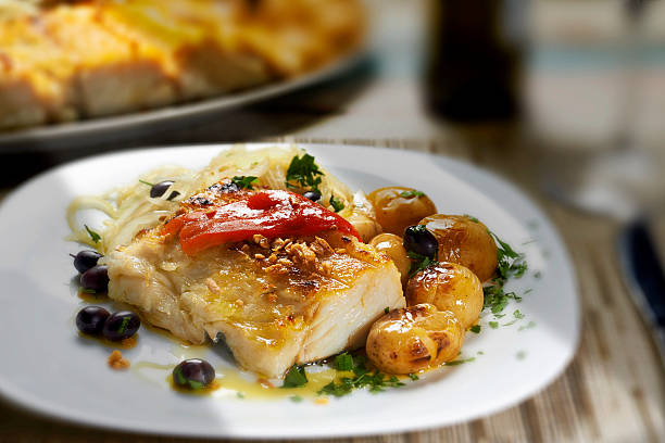 codfish cod with potatoes traditionally portuguese stock pictures, royalty-free photos & images