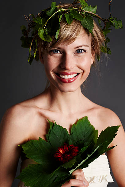 istock Smiling flower girl in studio, portrait 538046314