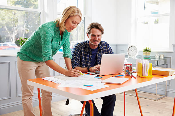 istock Couple Working Together At Desk In Home Office 538047446