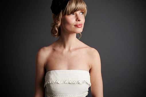 Beautiful bride in wedding dress, looking away