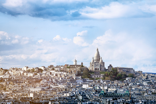 Ancient Basilica of the Sacre Coeur on Montmartre Hill, dedicated to the Sacred Heart of Jesus in Paris, France.