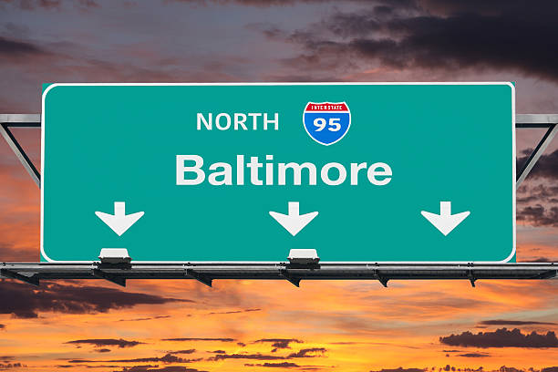 istock Interstate 95 to Baltimore Highway Sign with Sunrise Sky 538050176