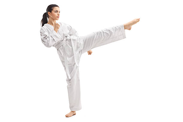 Woman Practicing Martial Arts In A Kimono Stock Photo - Download Image Now  - Martial Arts, Women, Karate - iStock