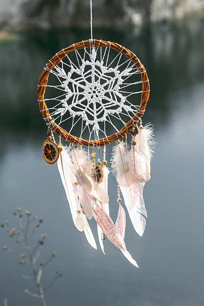 istock Handmade dream catcher on background of lake 538054090