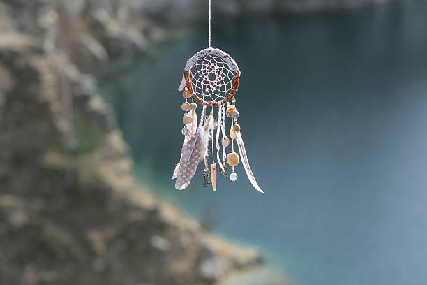 istock Handmade dream catcher on background of lake 538054238