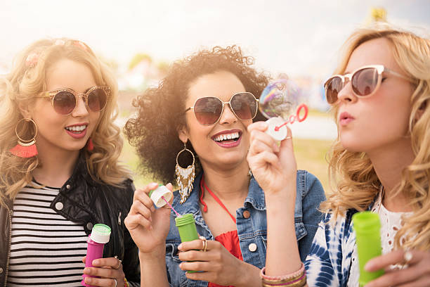 istock Blowing soap bubbles at the festival 538054378