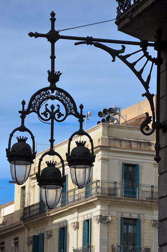 ornate spanish street lamps in barcelona, spain