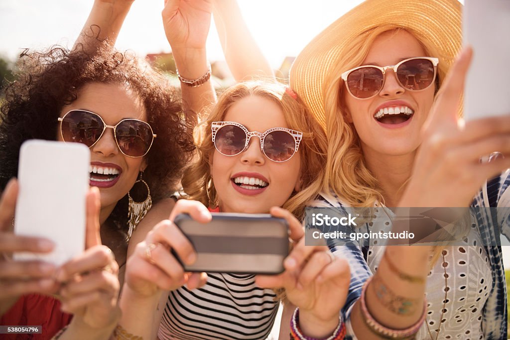 Taking photo of favorite singer Music Festival Stock Photo