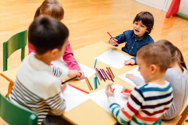 istock Preschool Children In Classroom Drawing 538056698