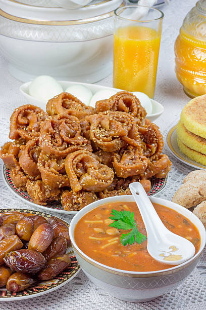 istock Bowl of Moroccan harira soup,chebakia, dates for iftar 538056770