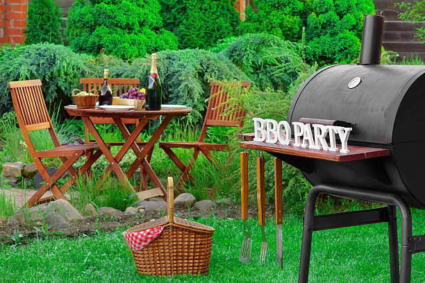 istock Barbecue Grill Appliance With Tools And BBQ Party Sign 538058614