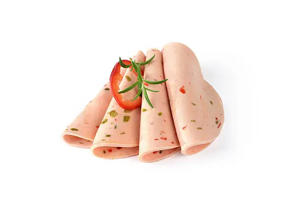 Sliced Bavarian sweet pepper sausage with rosemary on white background