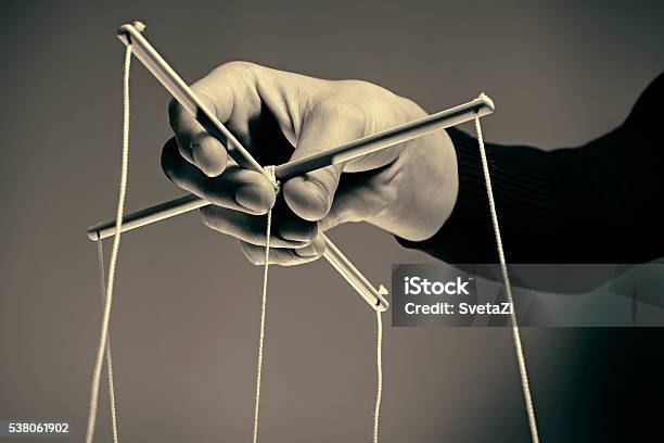 Manipulating Arm Stock Photo - Download Image Now - Puppet, Marionette, Control