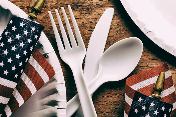 istock Small American Flags Sit Among A Picnic Table Seting 538063112