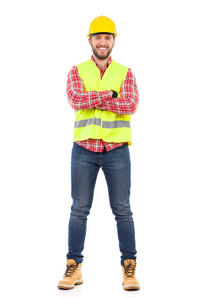 souriant travailleur manuel - manual worker full length isolated on white standing photos et images de collection