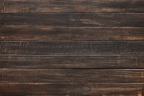 textura de madera pintado marrón natural y el fondo. - knotted wood plank wall abstract texture fotografías e imágenes de stock