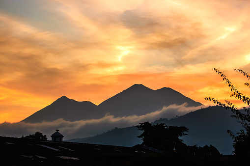 Sunset view of Fuego & Acatenango volcanos near Antigua, Guatemala, Central America