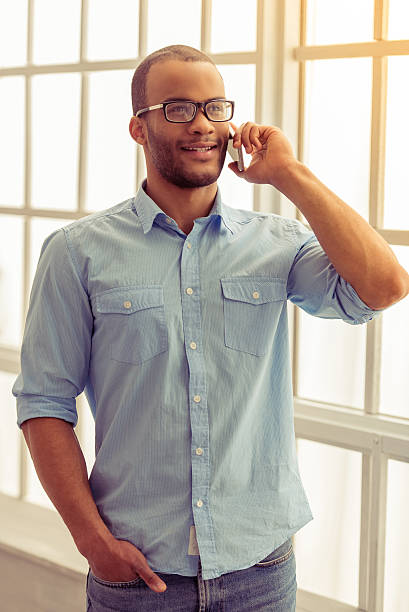 istock Afro American businessman with gadget 538065058