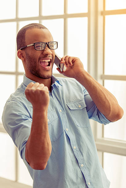 istock Afro American businessman with gadget 538065606