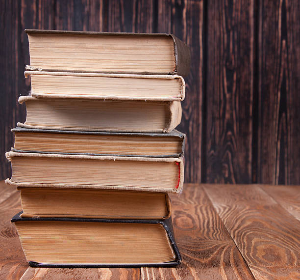 istock Old books on wood desk 538066136