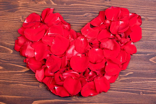 istock rose with red petals with hearts for Valentine's Day 538066217