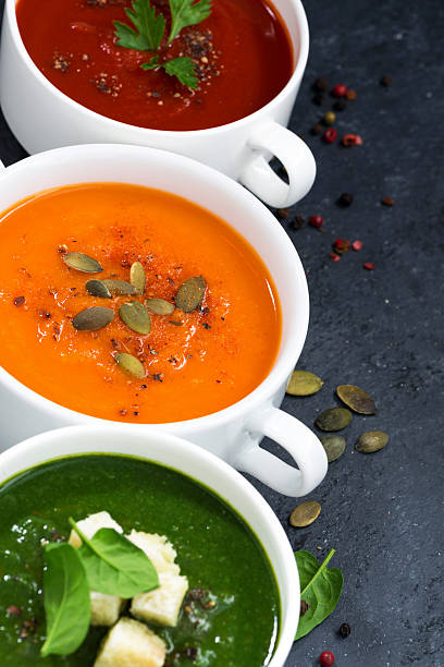 istock assortment of fresh vegetable cream soup on a dark background 538067588