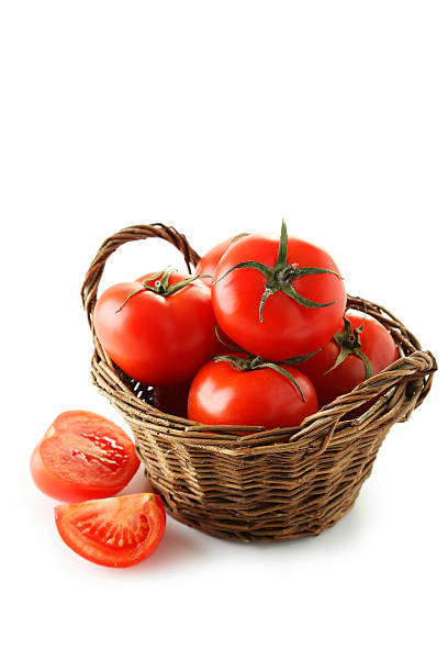 istock Fresh red tomatos in basket isolated on white 538067875