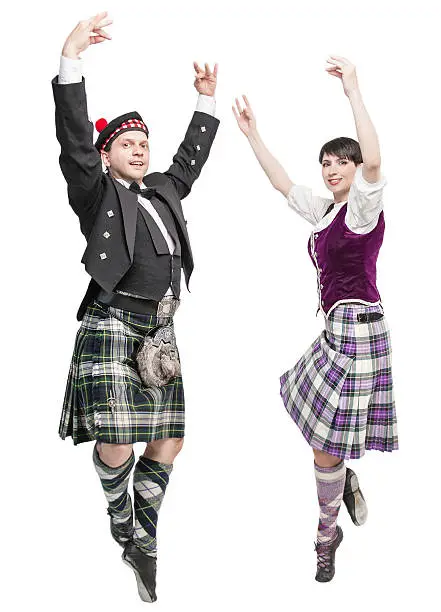 Pair of dancers of Scottish dance isolated
