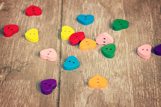 istock hearts on wooden background 538068495
