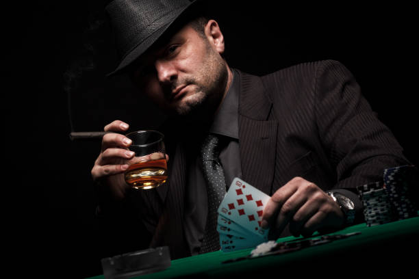 istock Gambler shows royal flush in his hand. 538068515