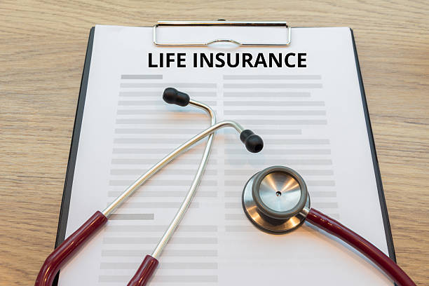 istock Life insurance form with stethoscope 538069144