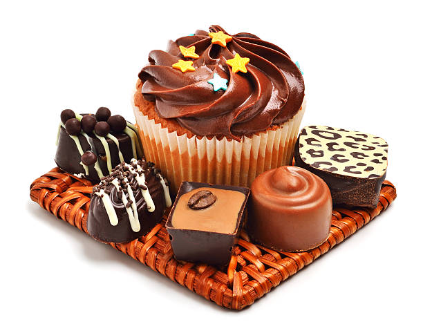 istock Chocolate muffin with chocolate sweets, candies isolated 538069547