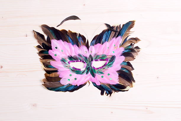 istock beautiful mask of feathers light board 538070931