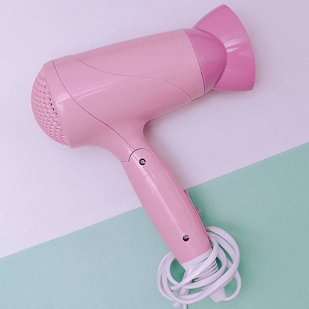 istock Pink Hairdryer glamorous accessory. Minimal style vanilla 538071322
