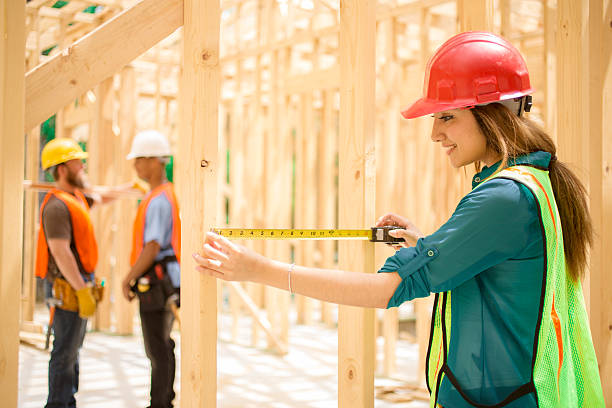 istock Female engineeer, inspector.  Construction job site. Framed building. 538071648