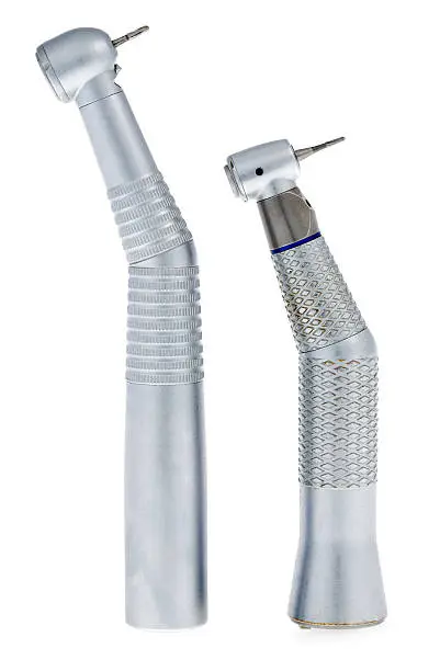 A set of two dental drills on a white background