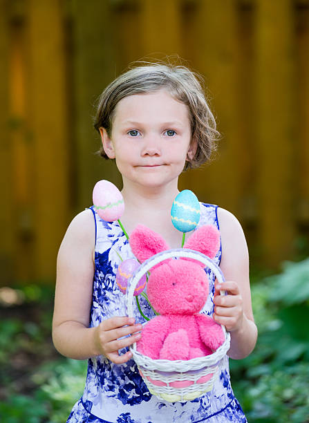 istock Girl Holding an Easter Basket With Bunny 538102169