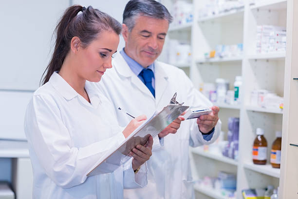 istock Pharmacist looking medication for a prescription 538102207