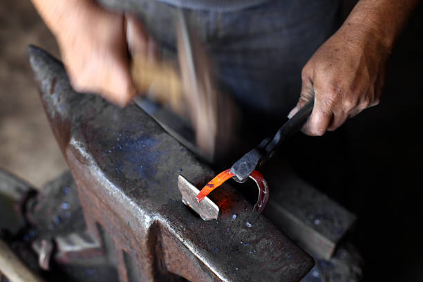 istock Anvil, horse shoe and hammer 538102741