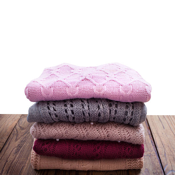 istock Knitting clothes on wooden background. 538103243