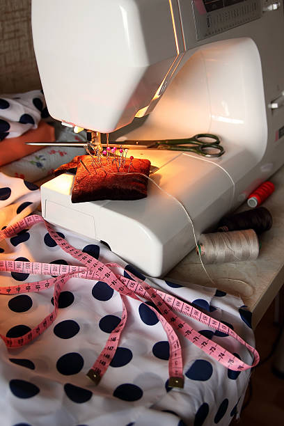 istock piece of fabric, pins, scissors and a sewing machine. 538121889