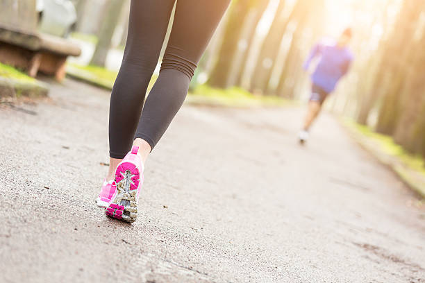 istock Female Runner Shoes closeup before Running at Park. 538121917