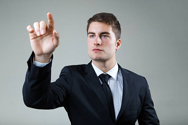istock Business man with pointing to something or touching a screen. 538123143
