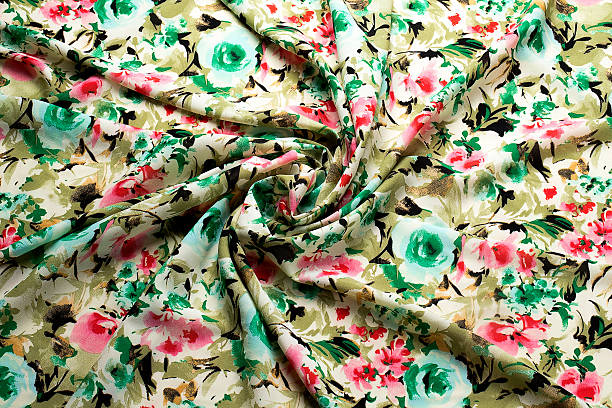 istock Closeup of a silky fabric texture with flower pattern 538125451